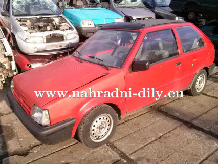 Nissan Micra červená na náhradní díly Praha / nahradni-dily.eu